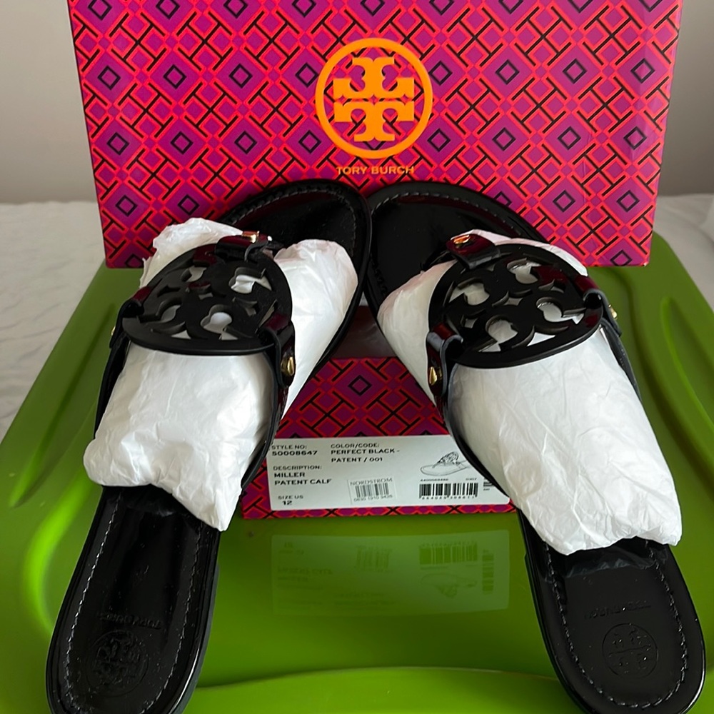 One pair of Tory Burch patent black Millers. Size 12